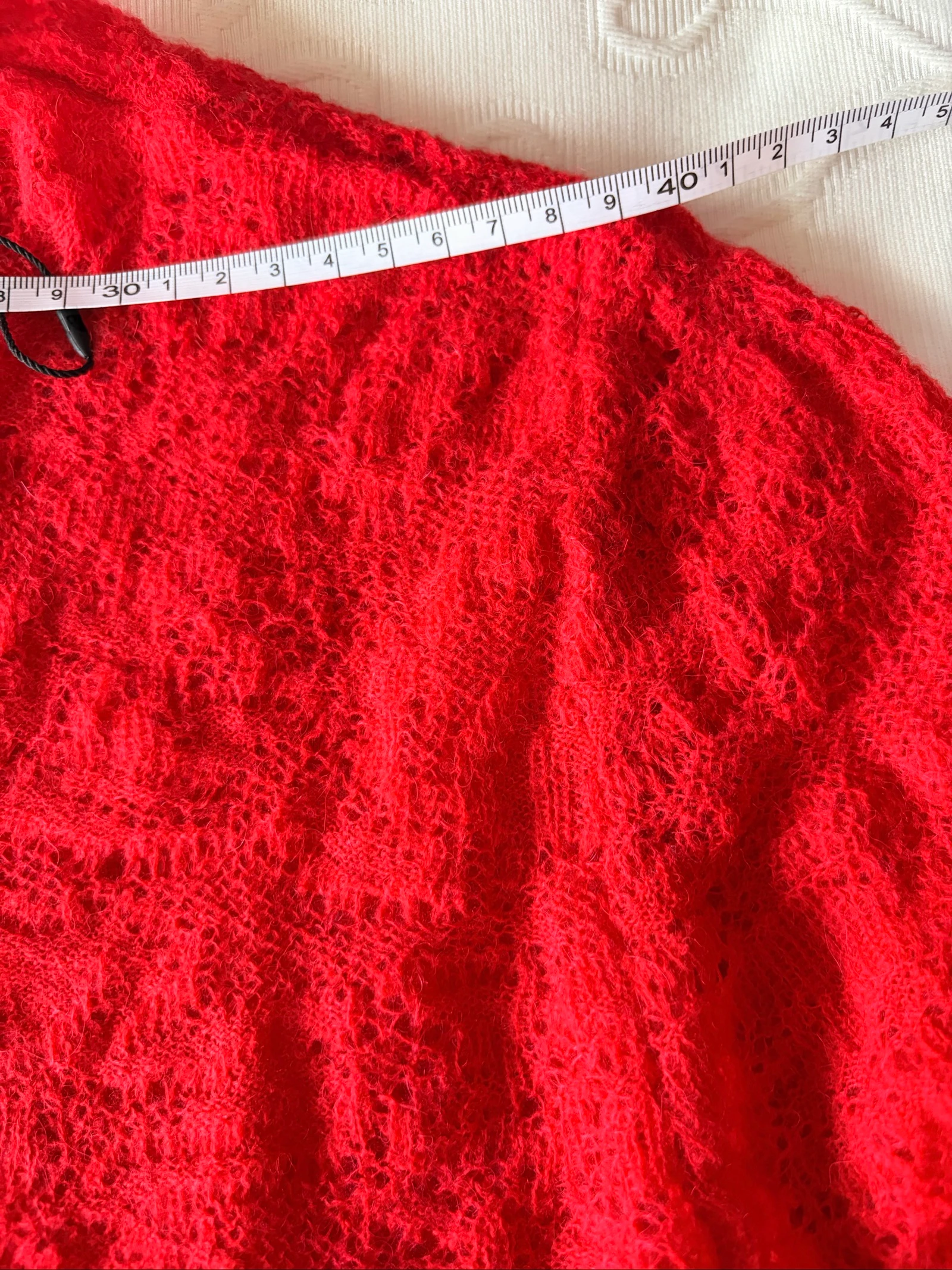 Pull rouge en maille ajournée – photo 2